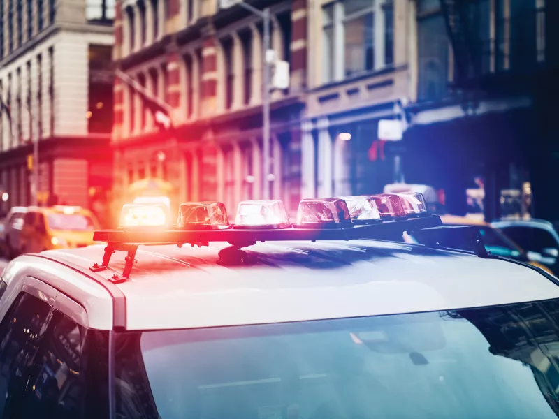 Police car with blue and red ligth on