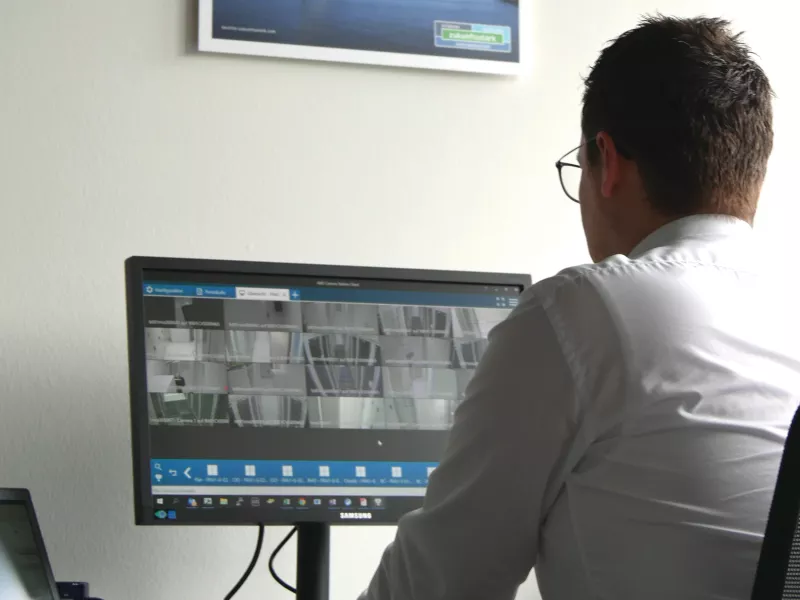 Man in front of computer screen