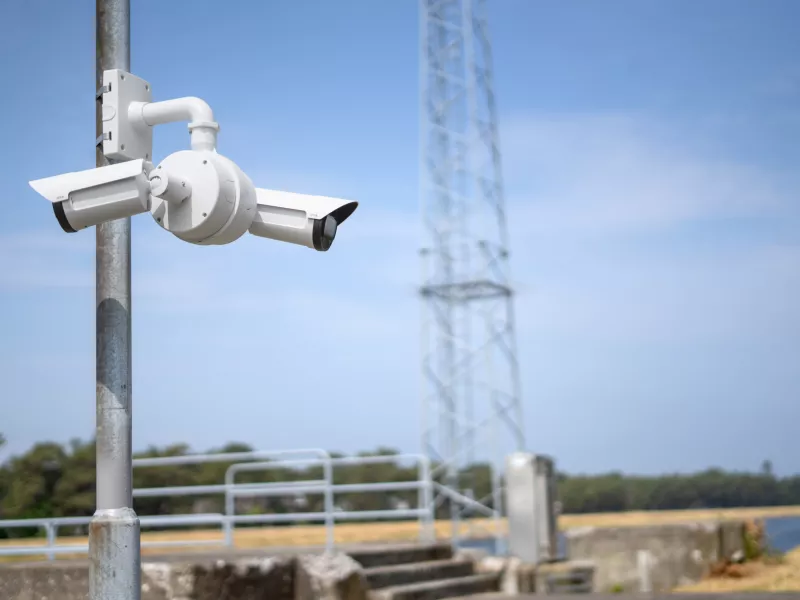 Two bullet cameras mounted together on a dual mount